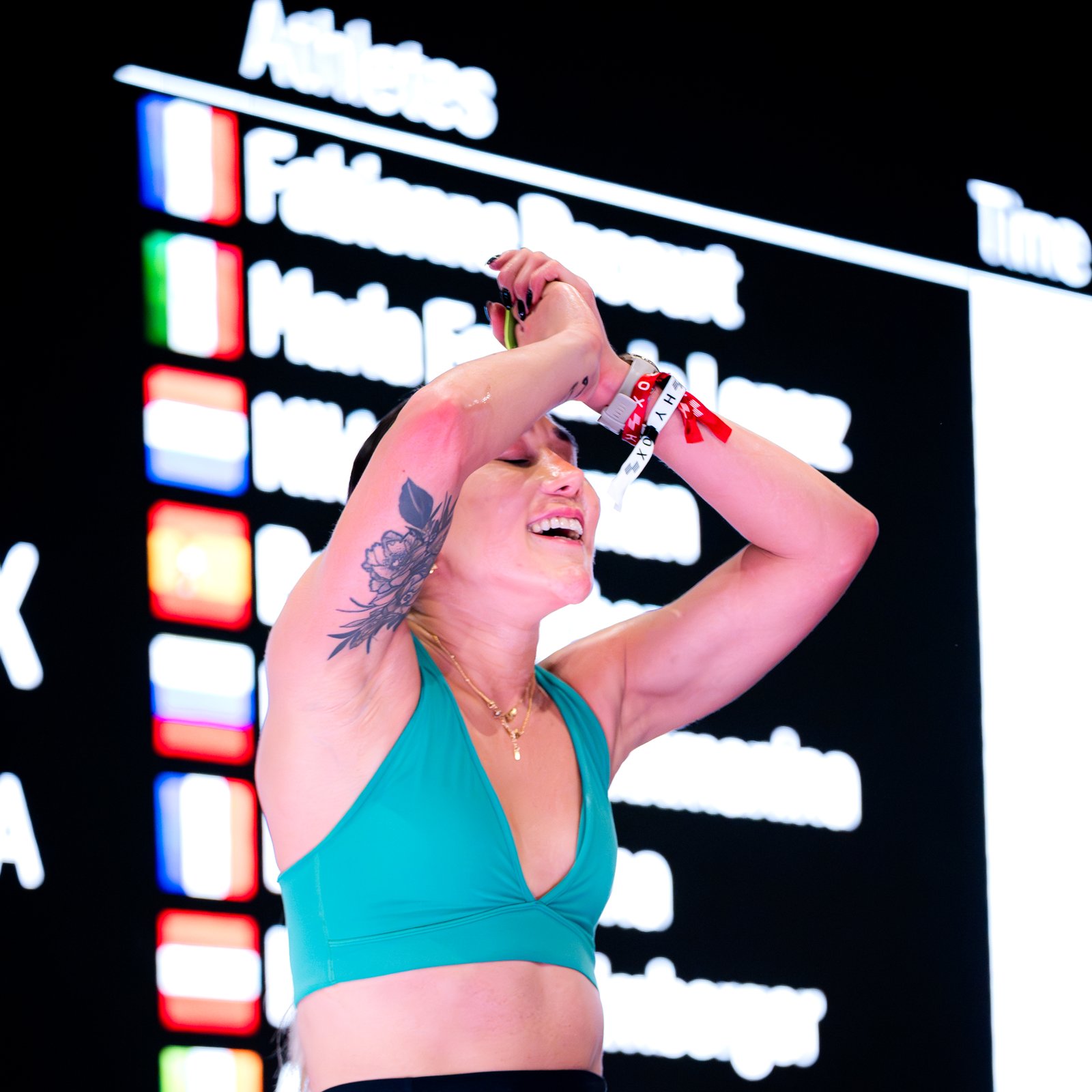 Maria celebrating at a HYROX race